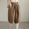 Pantaloni semplici casual da donna estivi in cotone e lino retrò letterario a tinta unita con elastico in vita taglia grande pantaloni a cinque punti