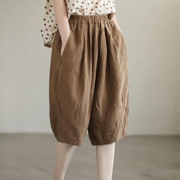 Pantaloni semplici casual da donna estivi in cotone e lino retrò letterario a tinta unita con elastico in vita taglia grande pantaloni a cinque punti
