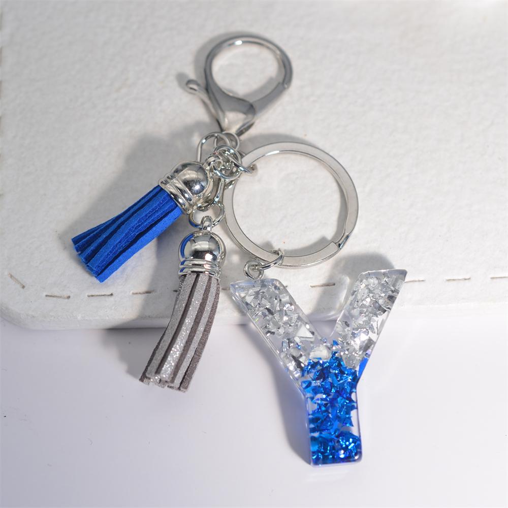 Креативные брелки из смолы с 26 буквами и кисточками — фото 30