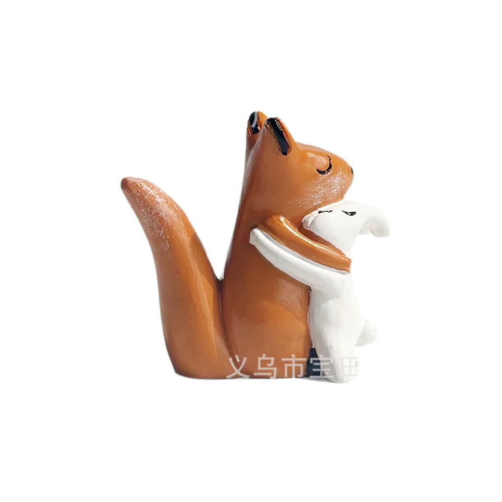 A fox and bunny with love hug home cartoon mini resin figurine ornament