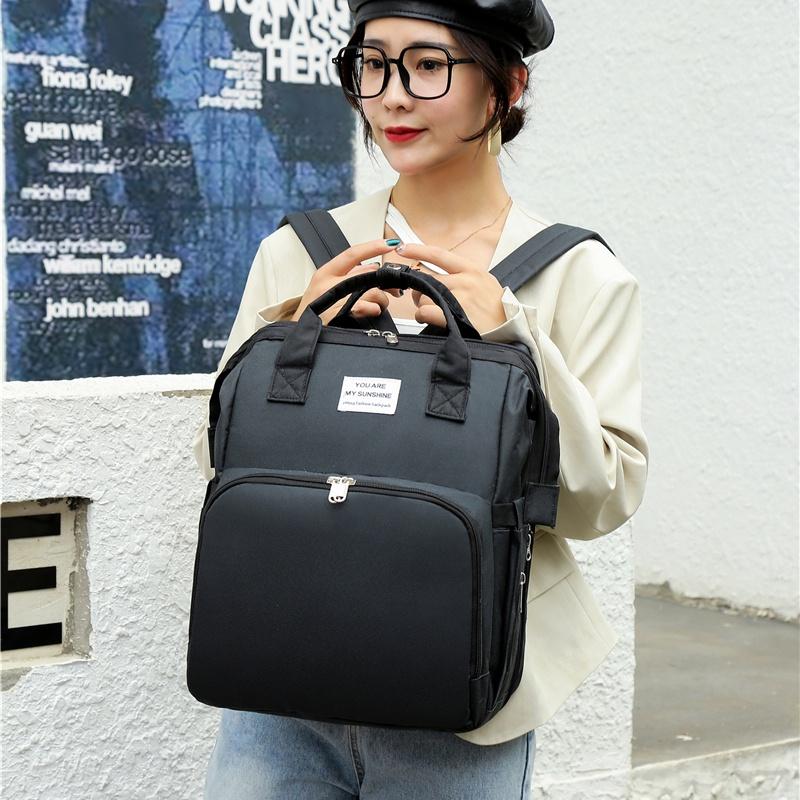 Neues faltbares Babybett mit Reisewiege und isolierter Tasche, 3-in-1-Wickeltaschen-Rucksack mit Wickelstation, tragbares Kinderbett mit Babytasche