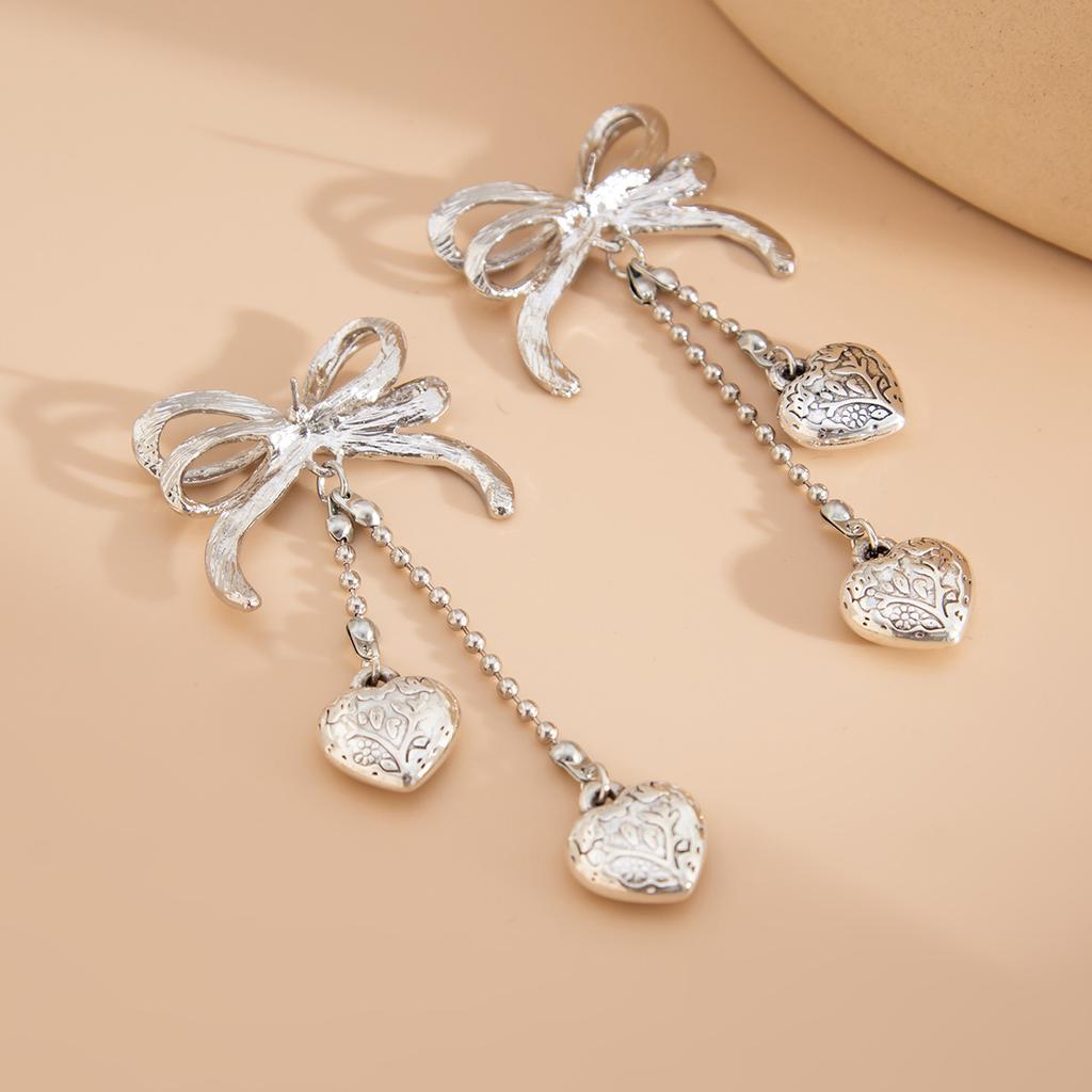 Französischer Schleifenquasten-Perlenketten-Ohrring Kreativer Silber-Gold-Farbiger Damen-Herzanhänger Lange Ohrringe Schmuckzubehör 2025