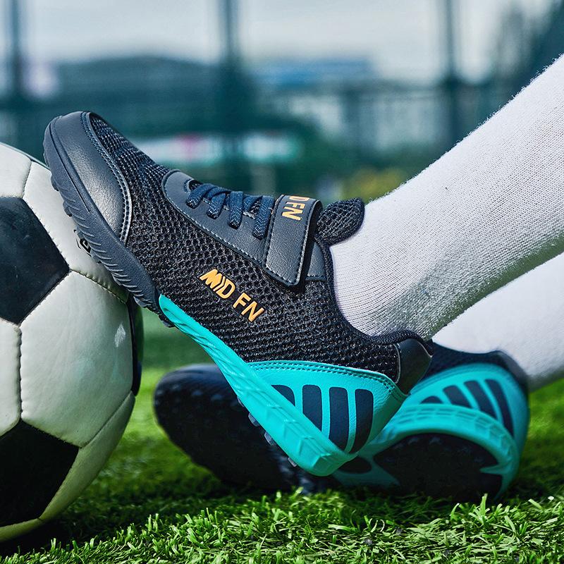 

Breathable mesh children s football shoes young and young low-top mesh broken nails flat bottom TF cement floor sports shoes training shoes 39