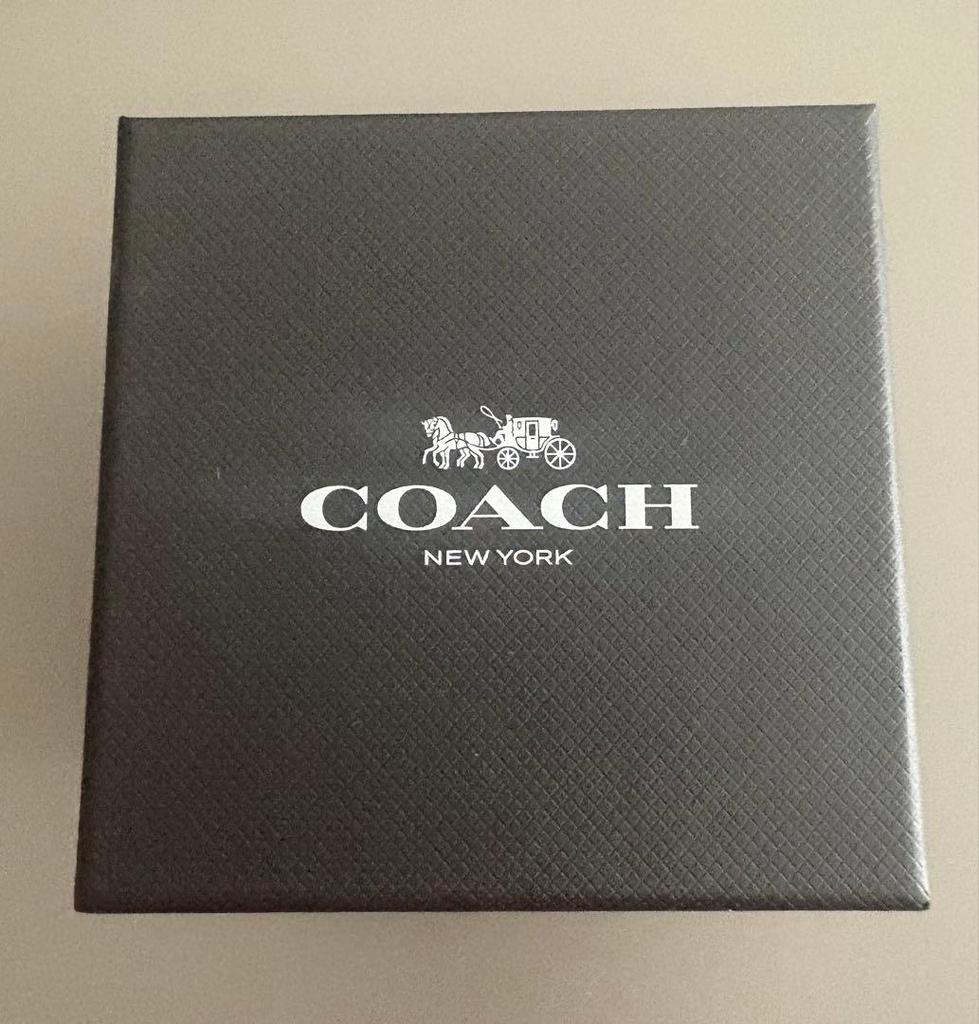 COACH watch silver stone embellishments.