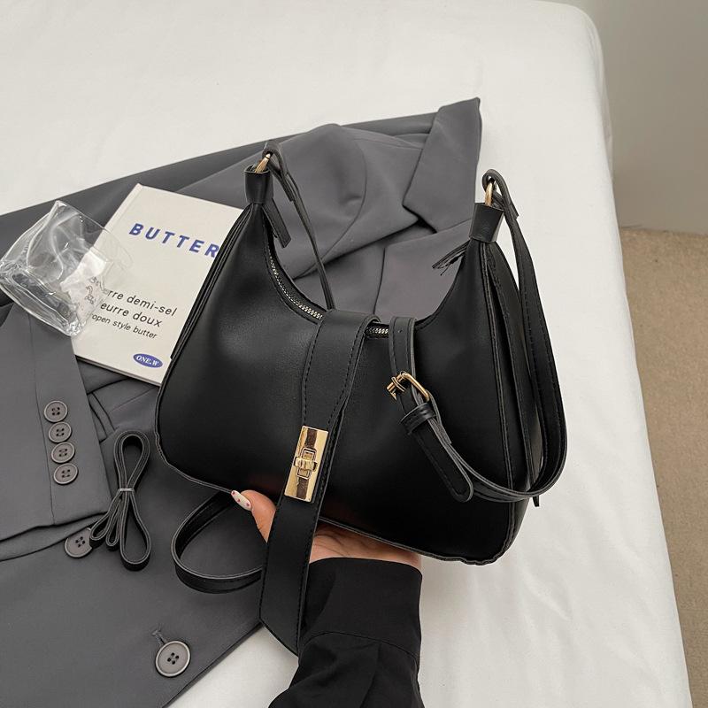 

Досуг модная простая атмосфера пригородных поездок персонализированная сумка-полумесяц модная сумка через плечо 2024 модная новая нишевая портативная женская сумка чёрный