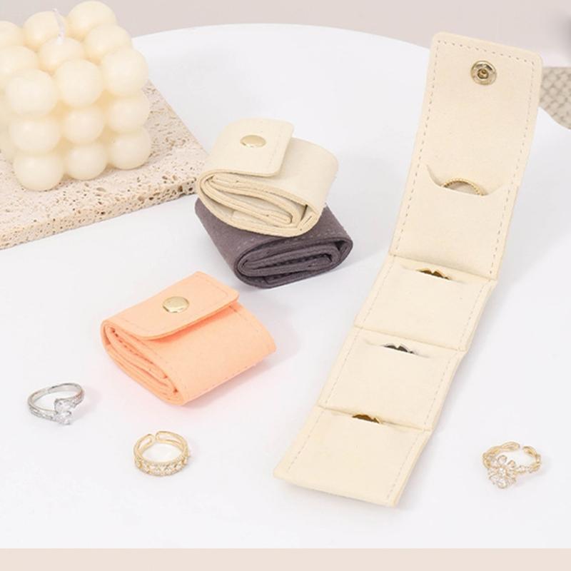 Compact Travel Jewelry Storage Case with a Folding Pouch Design, Separate Storage Spaces, and Snap-Fastened Flap for Small Jewelry