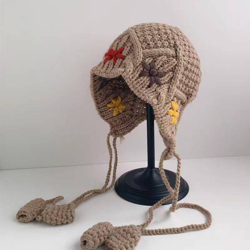 Handmade wool hat women's autumn and winter knitted warm head hat showing face small versatile flower straps ear protection bucket hat
