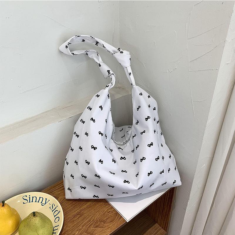 

Корейская нишевая дизайнерская сумка-мешок с бантом из холста женская сумка-тоут через плечо сумка для покупок складная новая стильная мода