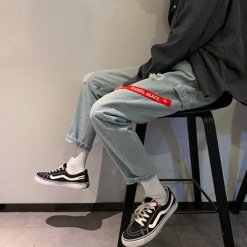 

Джинсовая ткань Capris Мужские сломанные дыры Модный бренд Свободные брюки с прямым стволом Корейская версия Модная широкая штанина Feel Dad Pants Модный