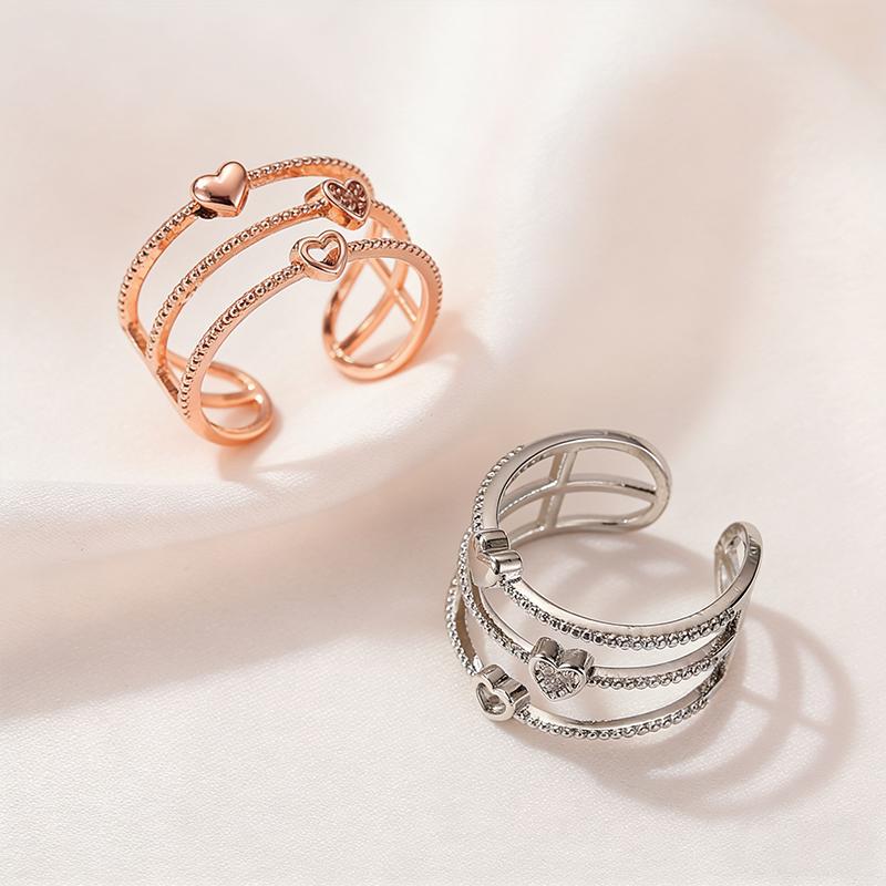 Fashionable women's simple multi-layer hollow heart personalized temperament versatile ring sweet anniversary commemorative ring
