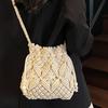 Simple woven straw bag New fashion niche design Crossbody bucket bag Seaside beach bag