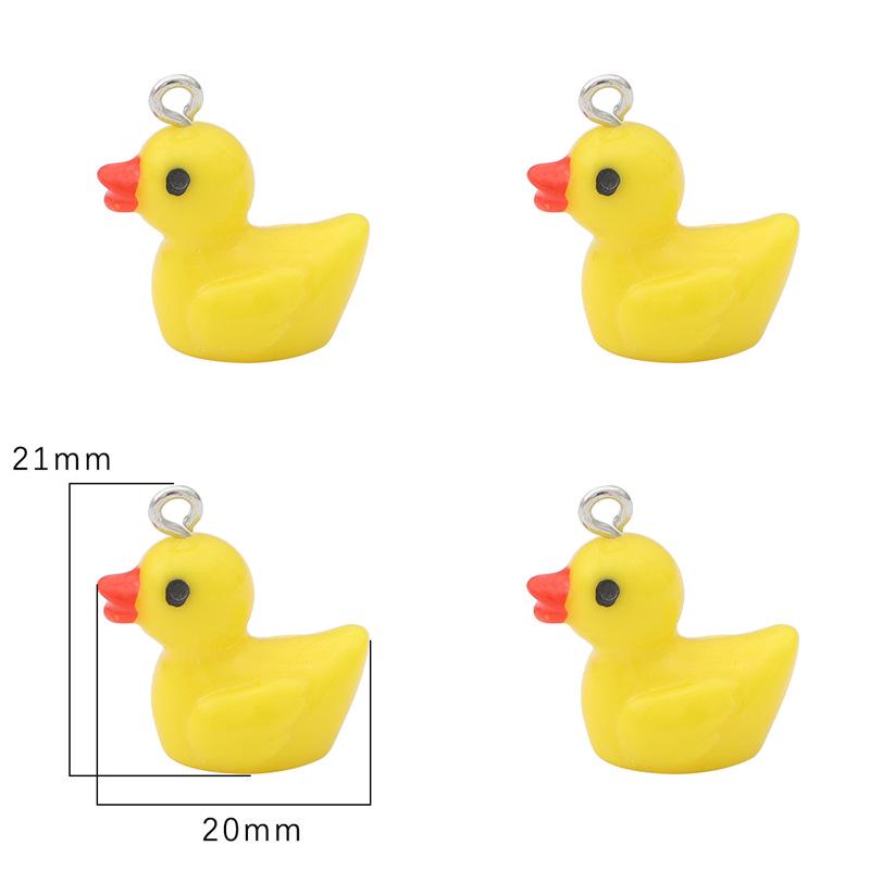 DIY pryskyřičné šperky a doplňky: Přívěsky Žlutá kachnička, Včelka, Růžový medvídek, Kobliha, Dinosaurus, Vejce, Lízátko.