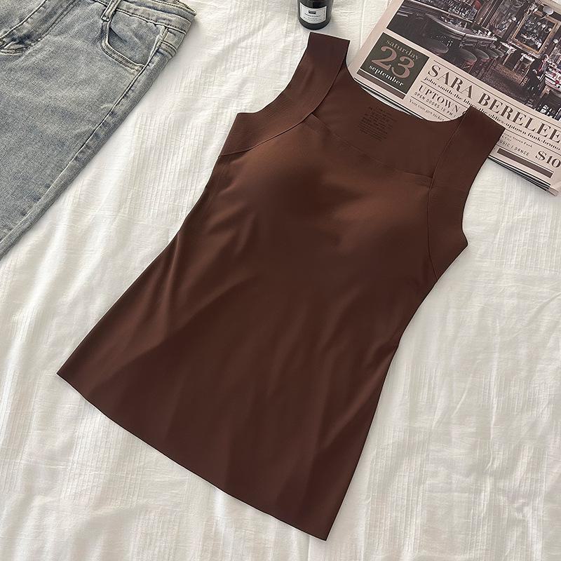 

Бесшовная антистатическая майка со встроенными подушечками для бюстгальтера, идеально подходит для облегающего кроя — идеально подходит для осеннего и зимнего сезона. XL 110-130 темно-коричневого