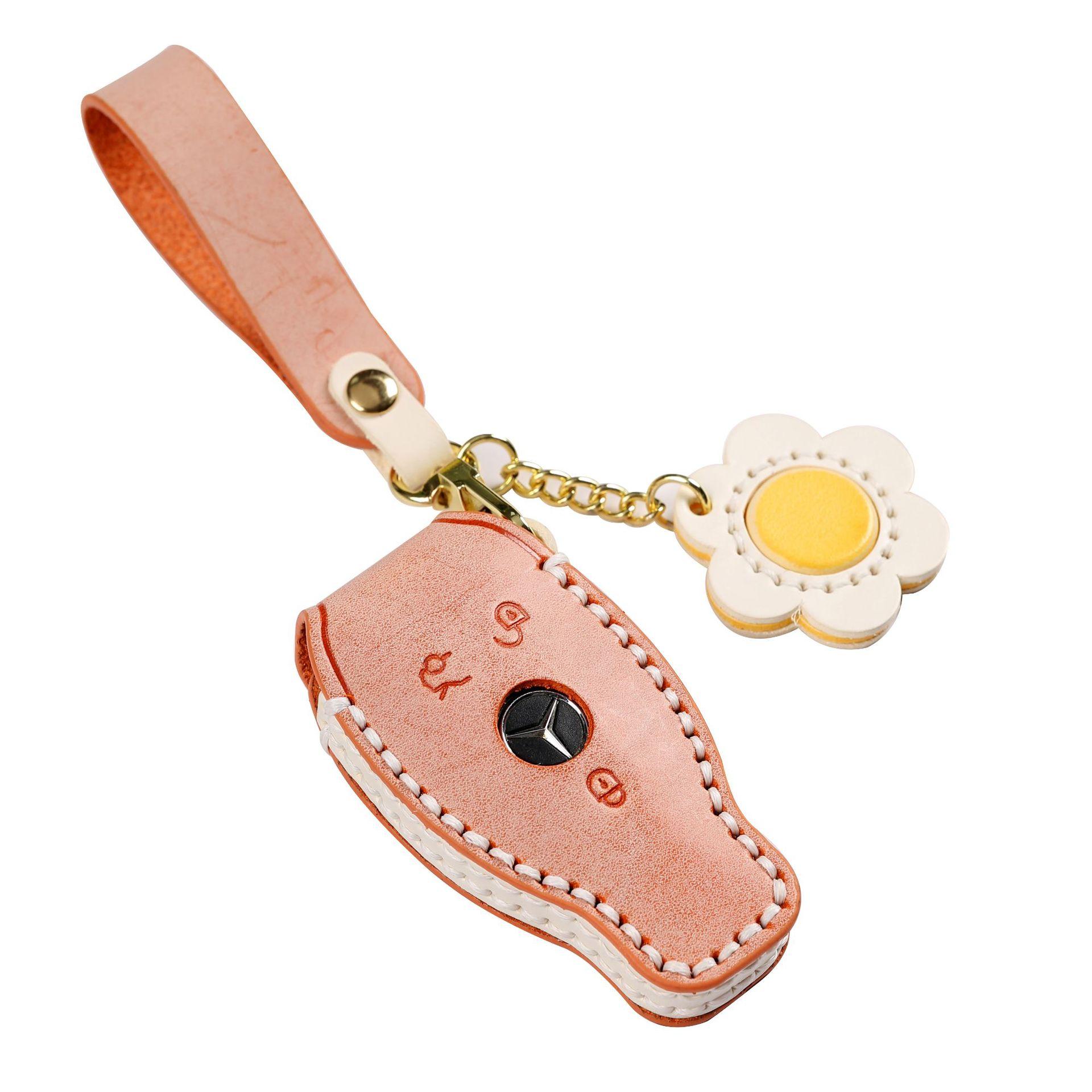 

The car key protective cover is suitable for the first layer of cowhide women s models for all Mercedes-Benz models розовый