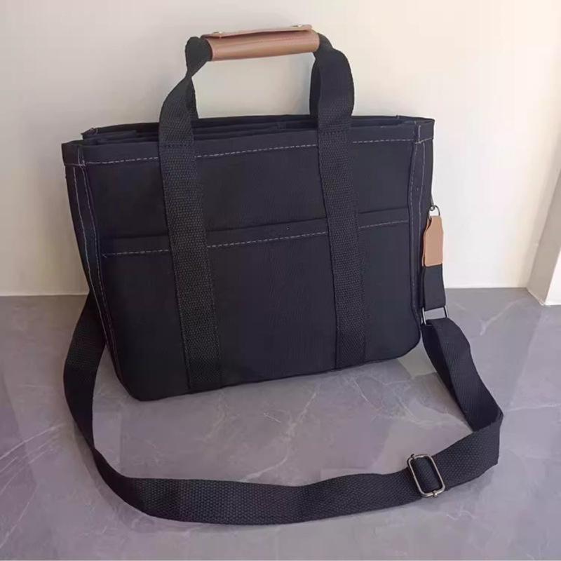 

Korean Fashion Mummy Bag: Multifunctional Mother & Baby Crossbody Handbag with Large Capacity and High-End Canvas Design чёрный