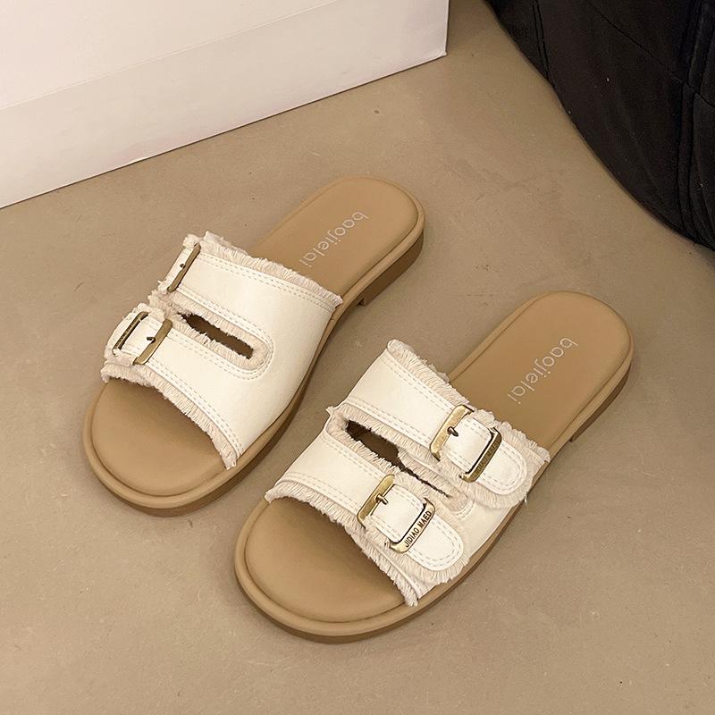 

Шлепанцы на плоской подошве женские летние для улицы 2025 новые повседневные под юбку мягкая подошва с перемычкой пляжные крутые шлепанцы 40