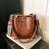 Bag Korean high-end sense versatile bucket bag autumn and winter retro niche design new broadband messenger bag women