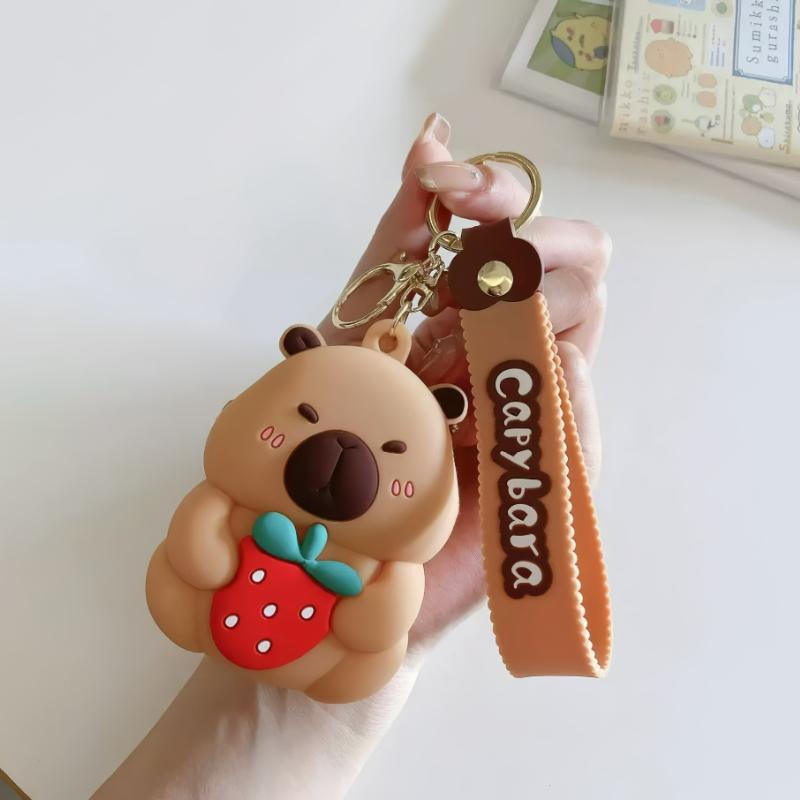 

Fashion Mini Capybara Coin Purse Strawberry Styles, Multifunctional Zipper Lipstick Storage Bag, Backpack Charm, and Phone Decoration светло-коричневого