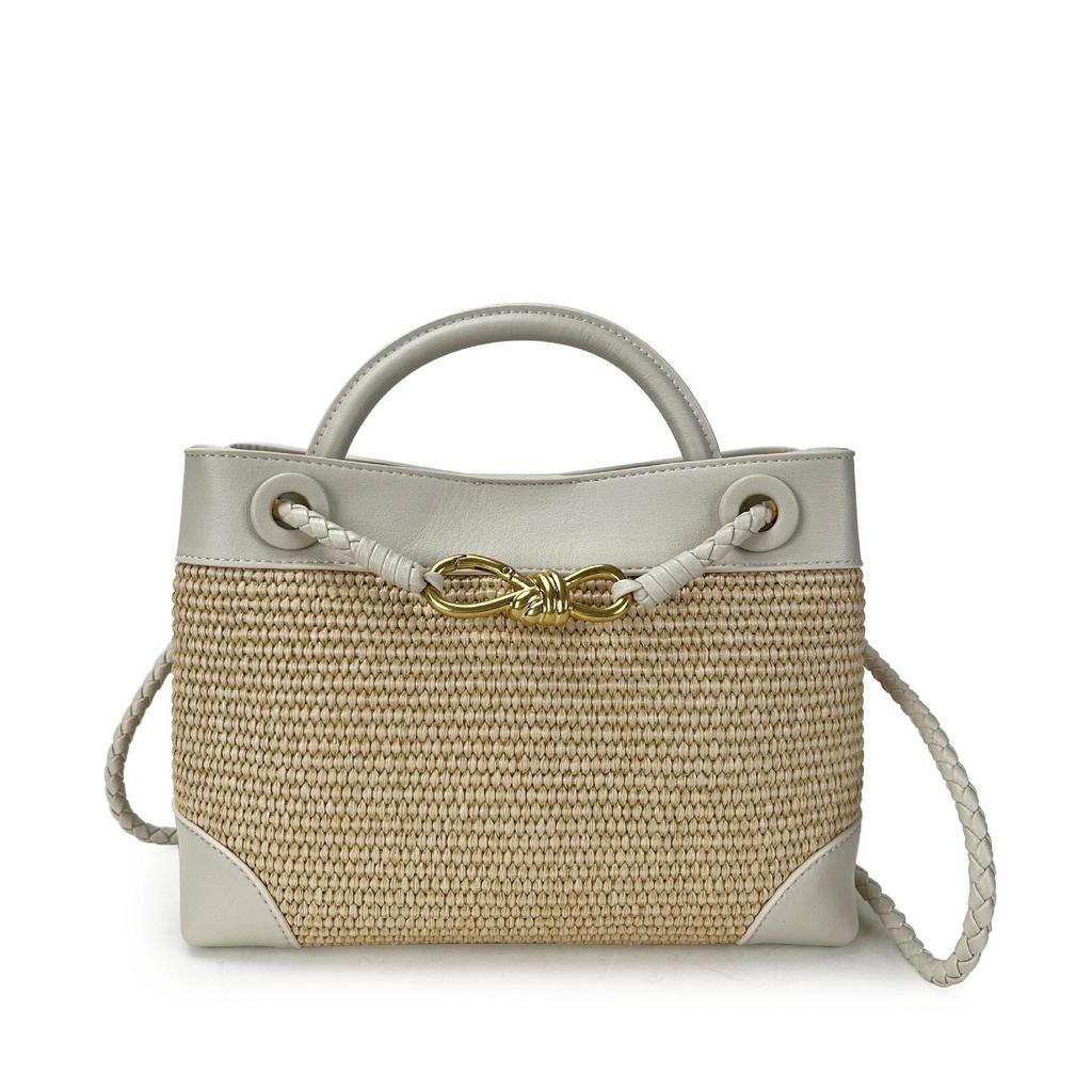2026 New Eight Character Metal Bow Leather Splicing Lafite Grass Handmade Straw Single Shoulder Crossarm Handbag