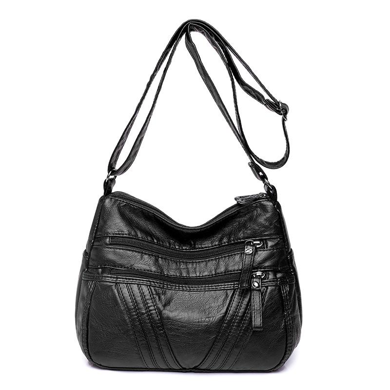 Damska skórzana torba dla matki w średnim wieku. Torba na ramię typu crossbody. Torba z wieloma kieszeniami
