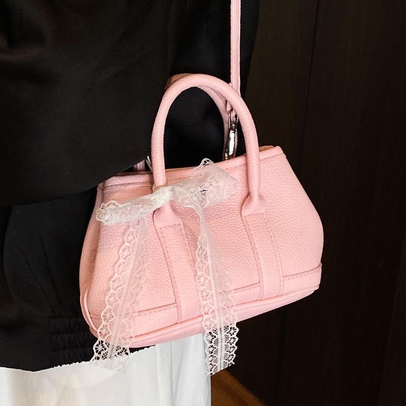 Korean fashion simple casual style portable bucket bag femininity high sense commuting versatile solid color messenger bag