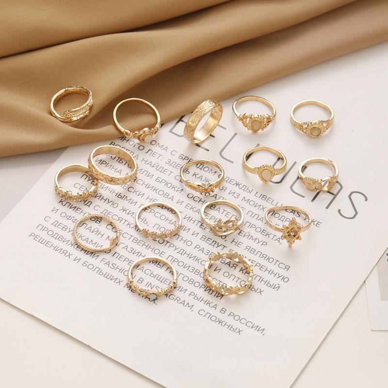 Modischer Opal Hohl Relief Elefant Mond Stern Kombination 16-teiliger Ring für Damen