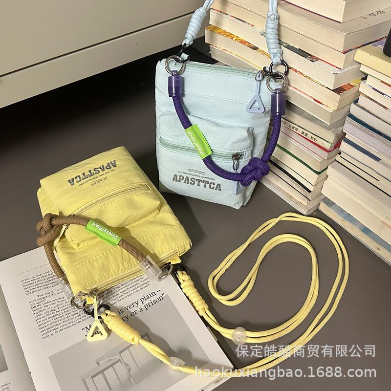 

Nylon bag women s summer 2025 new fashion niche design shoulder messenger bag high-end foreign mobile phone bag жёлтый