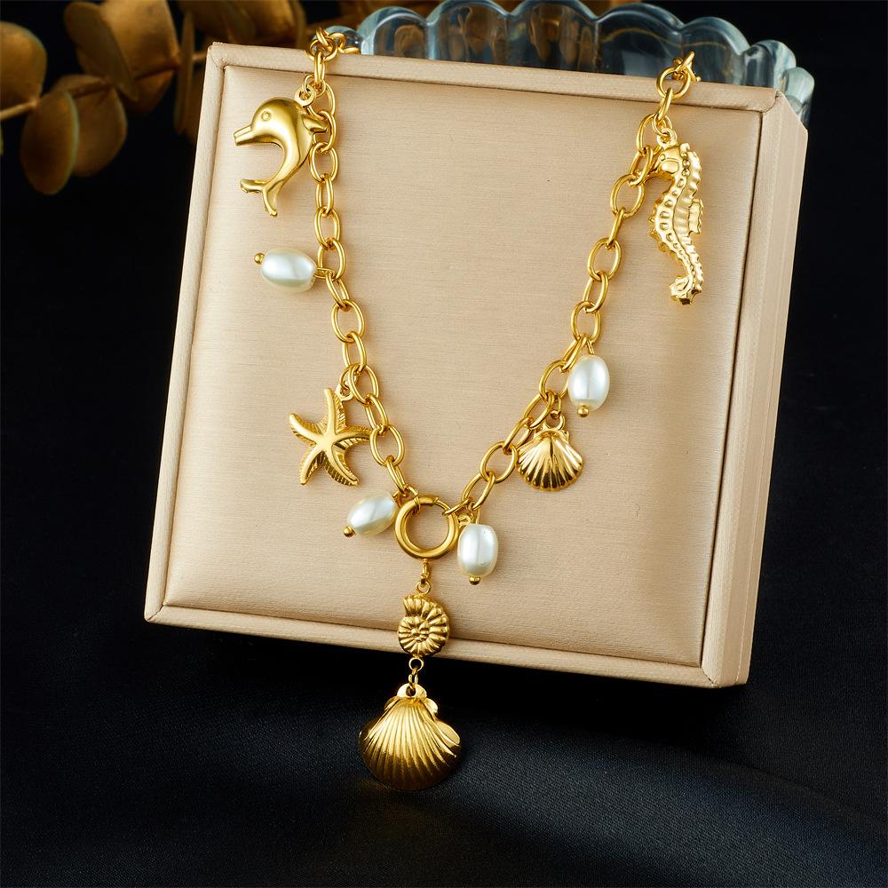 Ocean Themed Gold Tone Metal Chain Necklace with Starfish Seahorse Shell Design Fashion Accessory