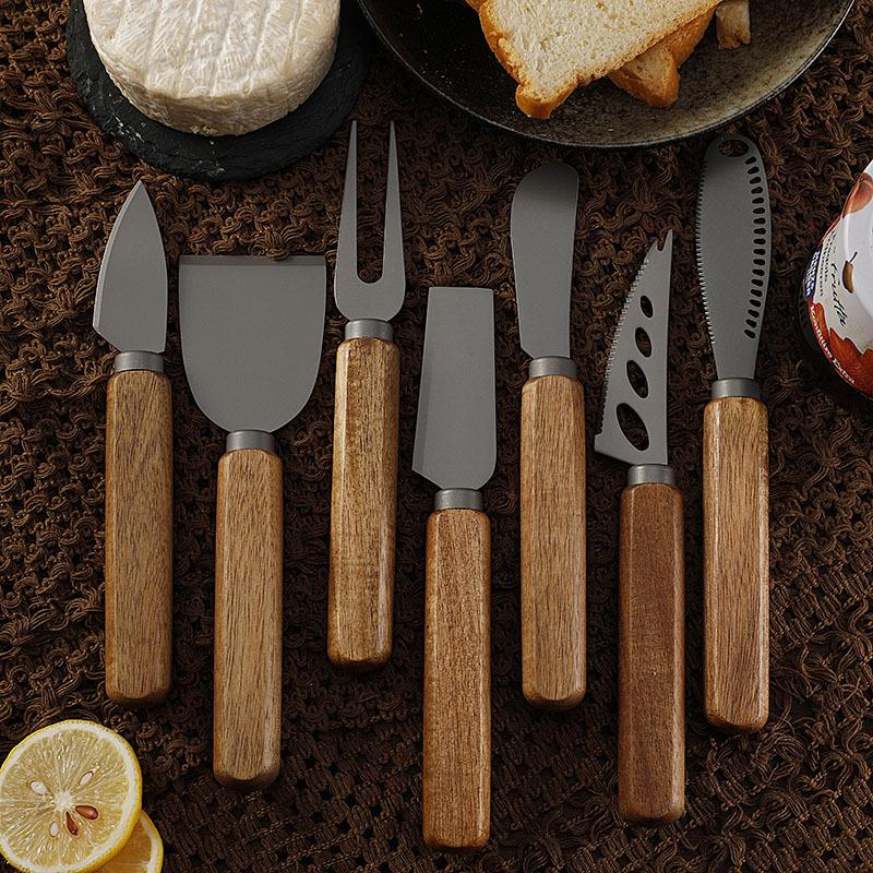 Käsemesser-Set aus Edelstahl mit Titanbeschichtung und Griffen aus Akazienholz (Enthält Butterspachtel, Steakmesser und Gabeln)