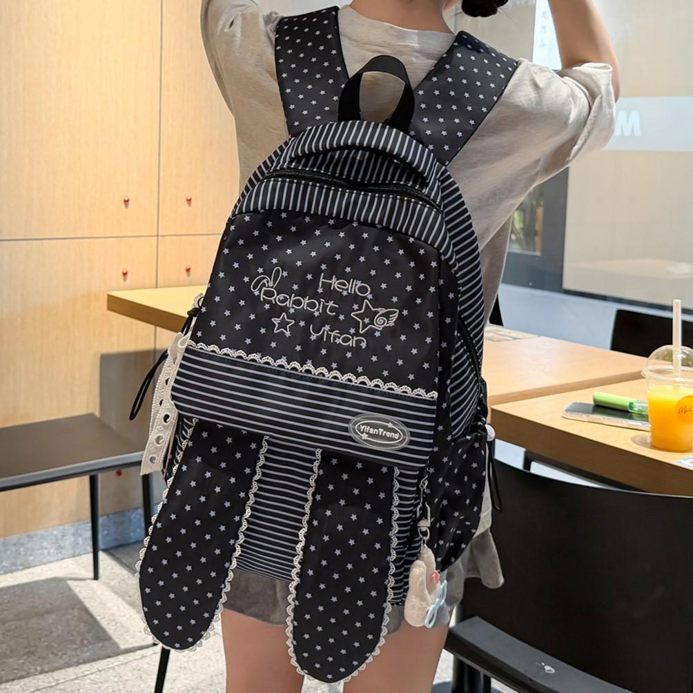 School bag: Sea salt blue vertical stripe rabbit ear backpack, star-studded backpack for middle and high school students, girls' casual travel lace