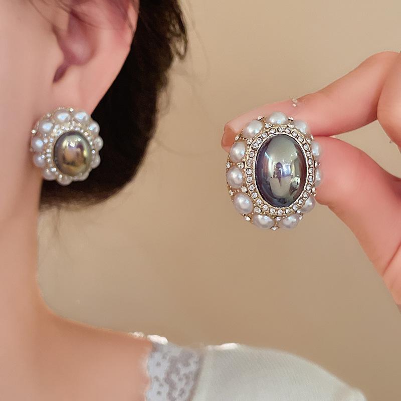 Silver needle court style diamond set oval imitation bead stud earrings personality temperament light luxury earrings