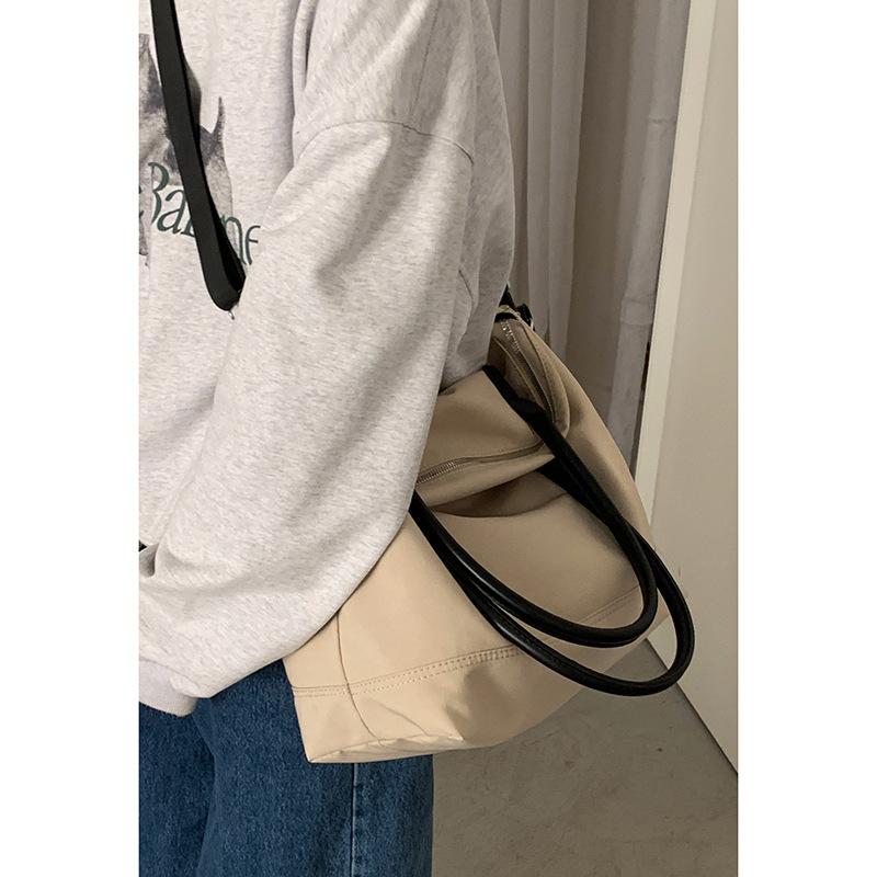 

Casual large-capacity nylon bag women s 2025 new fashion simple college tote bag portable travel bag