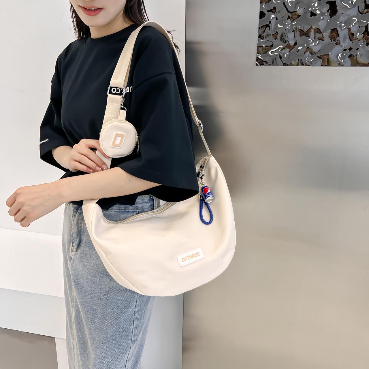 

Niche same trendy brand men s and women s letters crossbody large-capacity shoulder pain bag