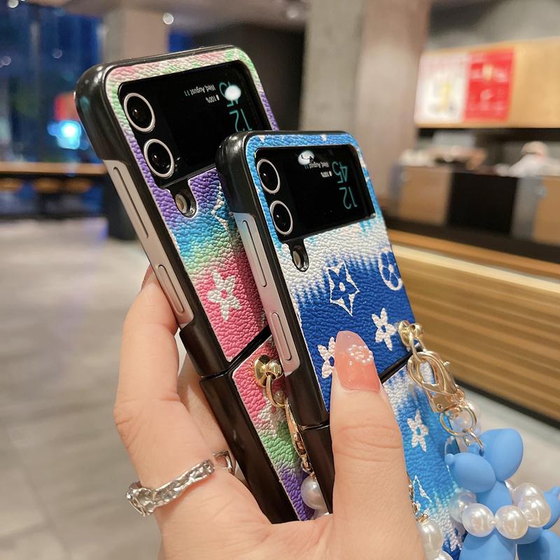 Custodia a cuore di lusso con fiocco in strass 3D con braccialetto di perle per Samsung Galaxy Z Flip 3 Z fold 4 Z Flip 5 Cover per Huawei P50 Pocket / oppo find N2