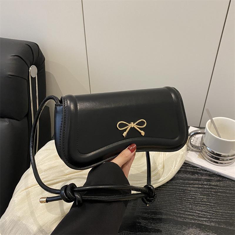 Korean version bow indentation 2025 new trendy fashion solid color design casual messenger portable small square bag women