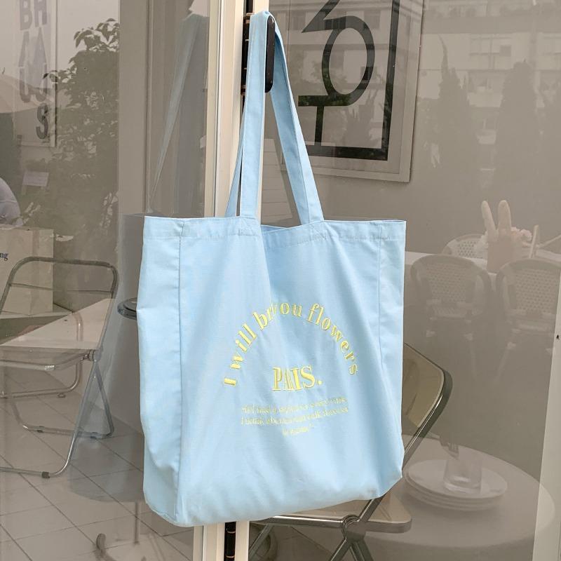 

ins wind women s canvas bag letter embroidered shoulder bag large capacity student tote bag shopping bag