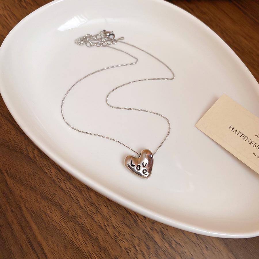 Retro Irregular Bow & Heart Tassel Necklace - Cool Versatile Clavicle Chain for Autumn & Winter