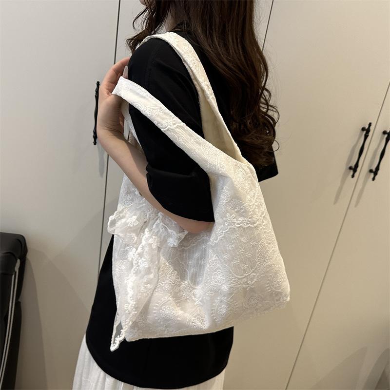Sacs d'épaule en dentelle brodée décontractés pour femmes Sacs à main simples polyvalents pour dames Grand sac fourre-tout léger Sac gilet pour femme pour le travail