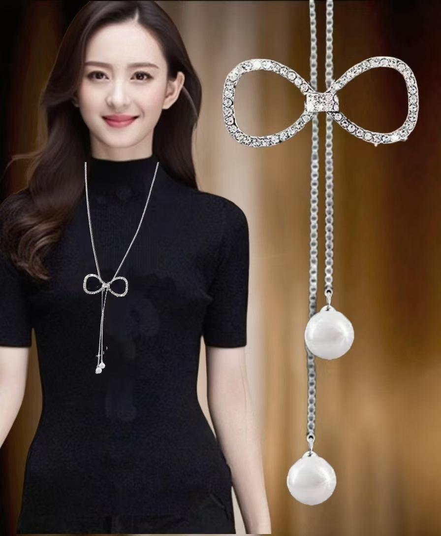 Korean version autumn and winter sweater chain long pearl necklace pendant autumn and winter temperament fringed jewelry accessories