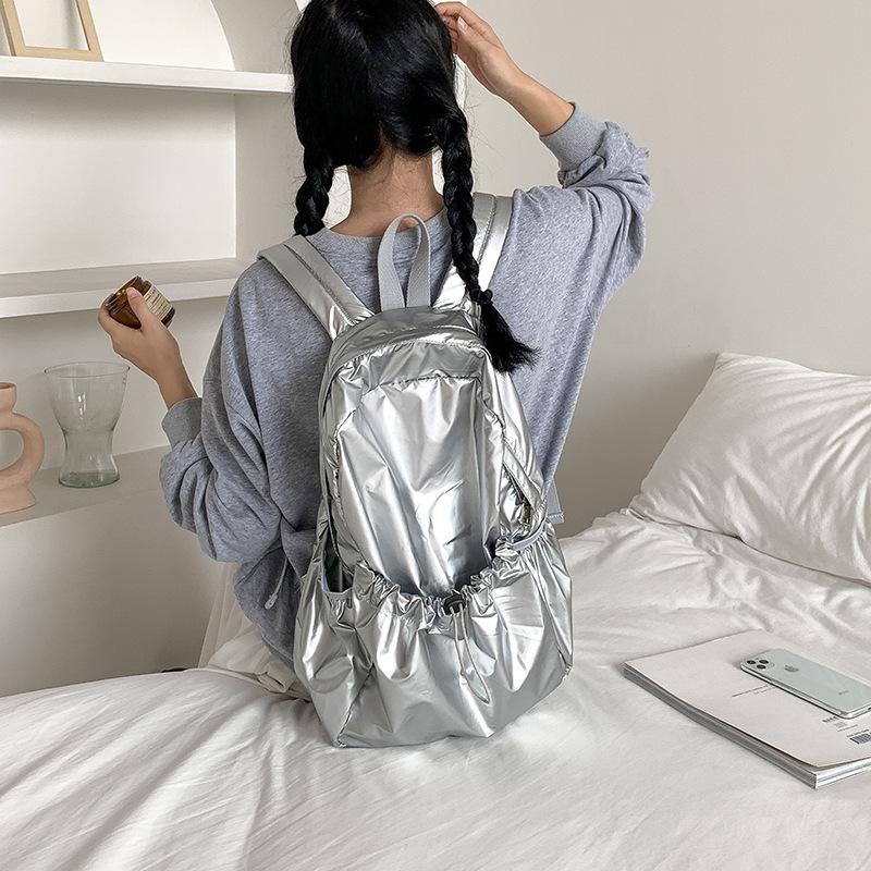Sac à dos premium en cuir souple Argent Version coréenne Nouveau design de niche Grande capacité Tendance Sac à dos pour filles