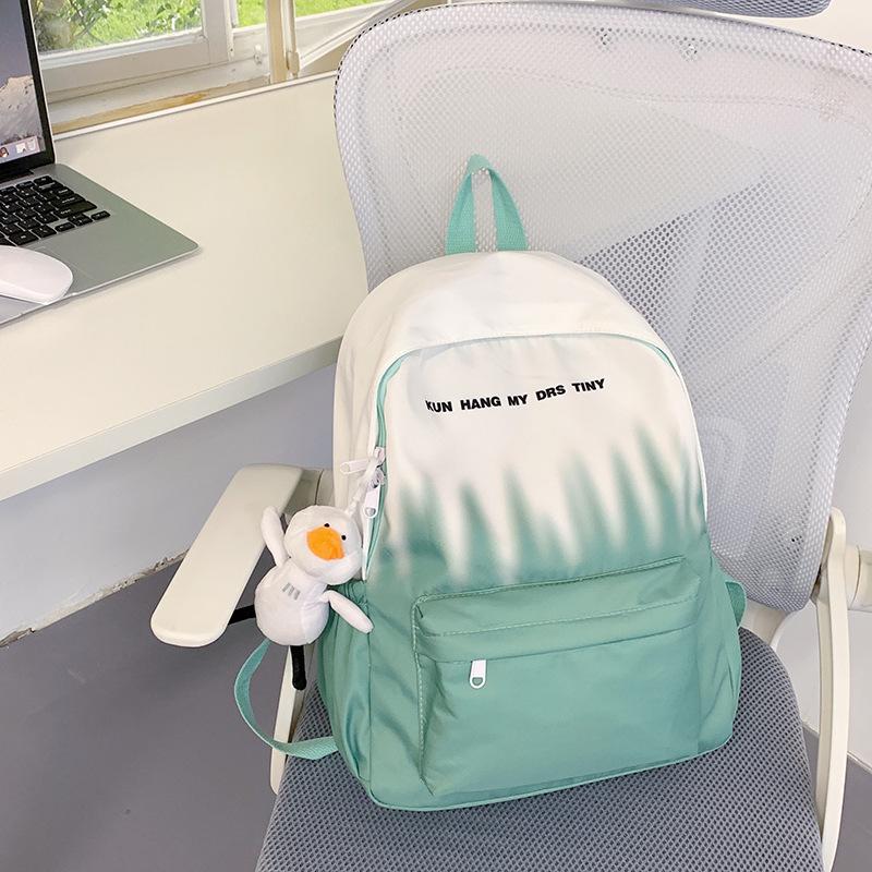 Graffiti Gradient Personality Schoolbag College Students' Backpacks for Boys and Girls' Travel Schoolbags Are Light and Large Capacity Backpacks.