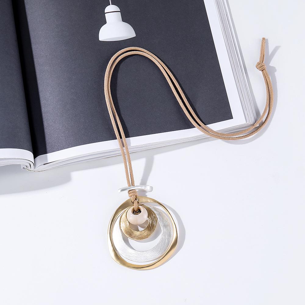 

European and American contrasting colors geometric oval metal pendant women s sweater chain