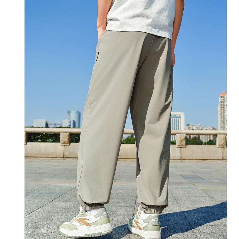 Anta Casual Simple Solid Color Tapered Loose Knit Sports Pants Men Bottoms Gray 952528303-1