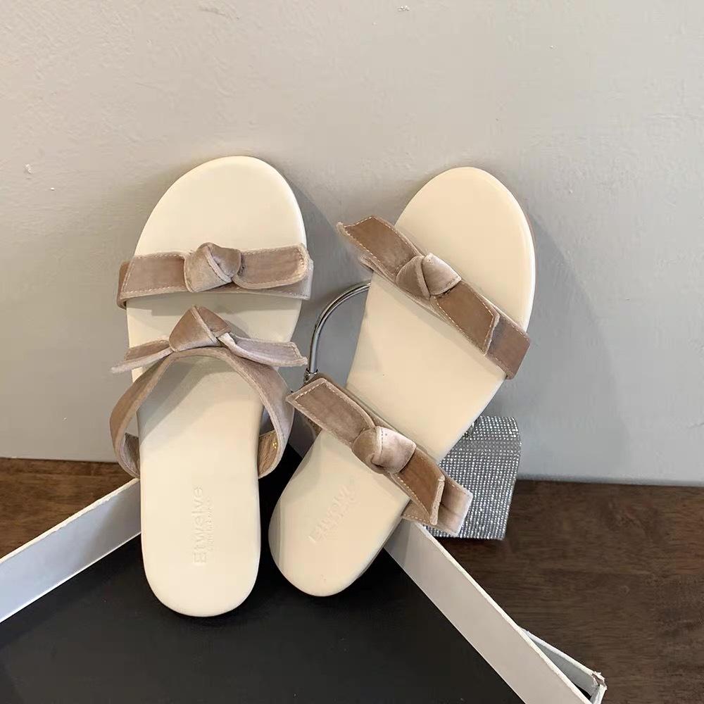 

Summer fashion versatile flat bottom word with bow velvet non-slip fairy French new toe girl cool slippers 43 абрикосовый