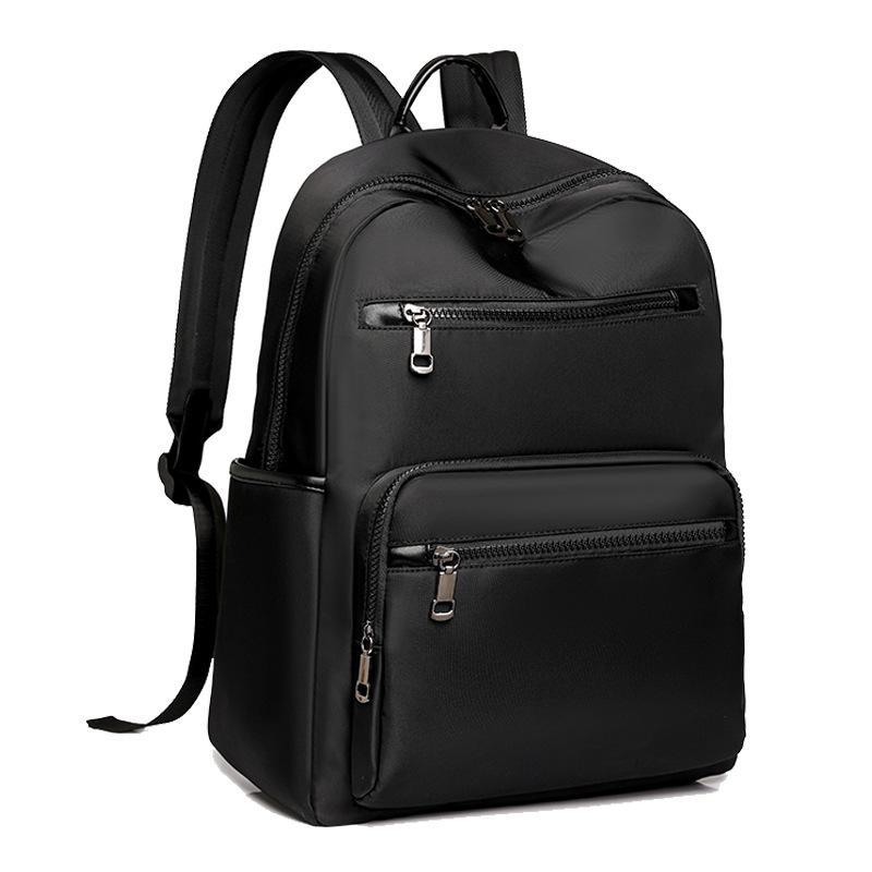 High-End Casual Waterproof Nylon Backpack: Fashionable, Lightweight Travel Bag for Men & Women, with Shoulder Straps & Laptop Compartment.