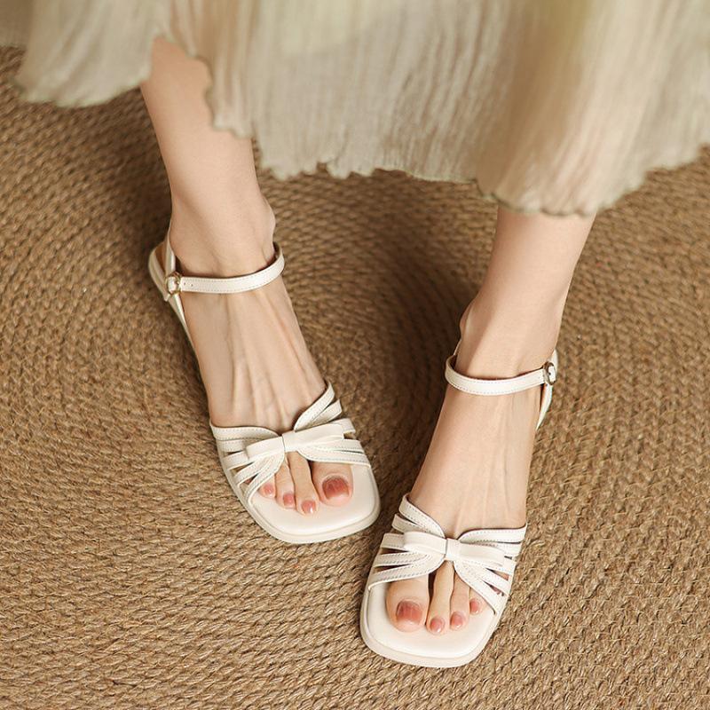 Summer women's flat-soled sandals Korean version of the new one-word sandals with rubber soft sole buckle large size shoes solid color round head