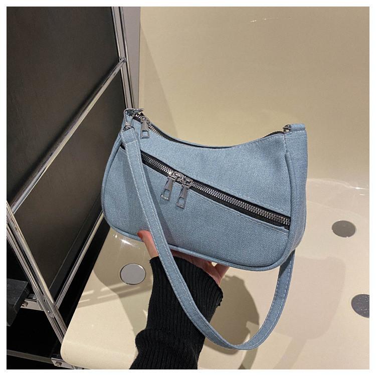 Neue Streetstyle-Umhängetasche aus Canvas für Damen (2024): Modisches Design mit schickem Achselbereich, trendig und vielseitig.