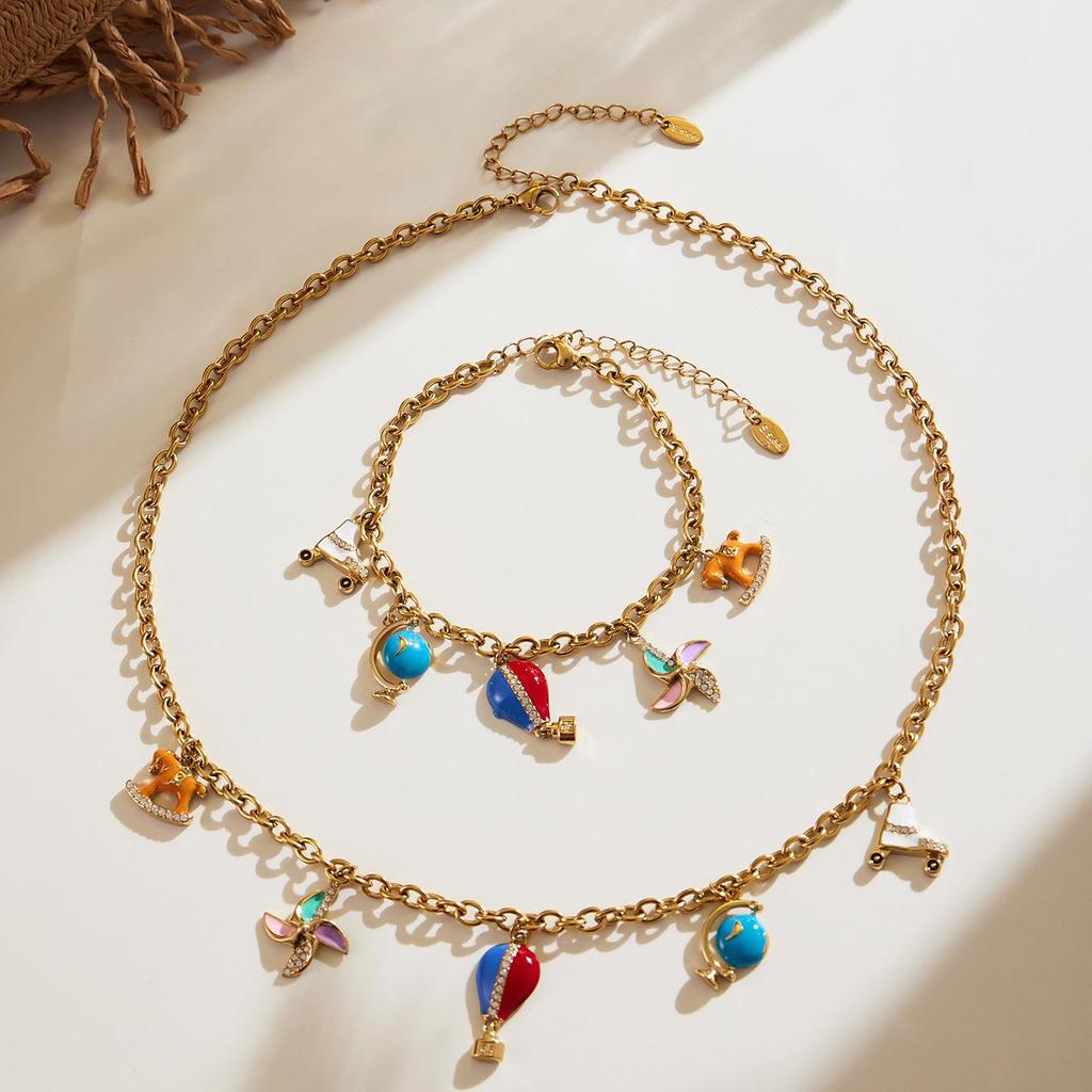 Oumaijia Stainless Steel Zircon Pendant Jewelry Set: Non-Fading Bracelet & Necklace