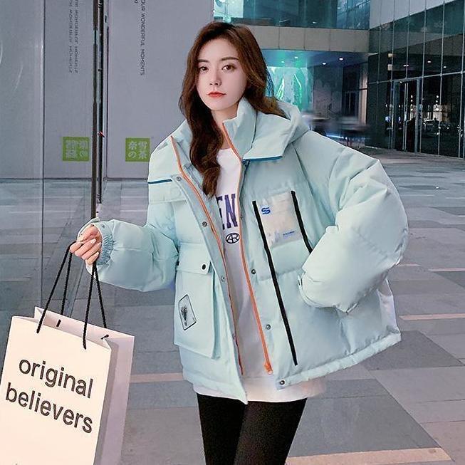 

Свободный и тонкий пуховик нишевого дизайна