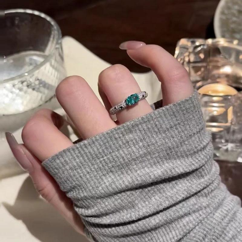 Hui Zhi Yi S925 Silver Paraiba Ice Flower Ring with Full Diamond Setting.
